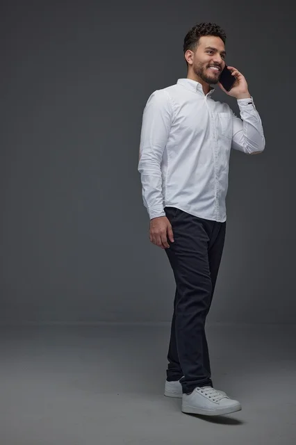Saudi Man Talking on Smartphone in Studio
