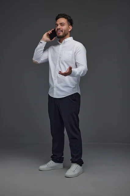 Arab Man Talking on Smartphone in Studio