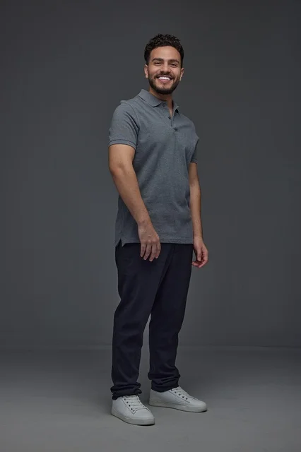 Smiling Saudi Man in Casual Wear Studio Portrait