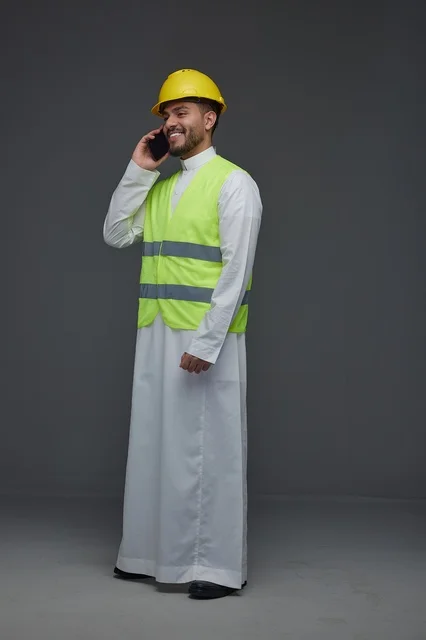 Saudi Engineer with Hard Hat and Phone Studio