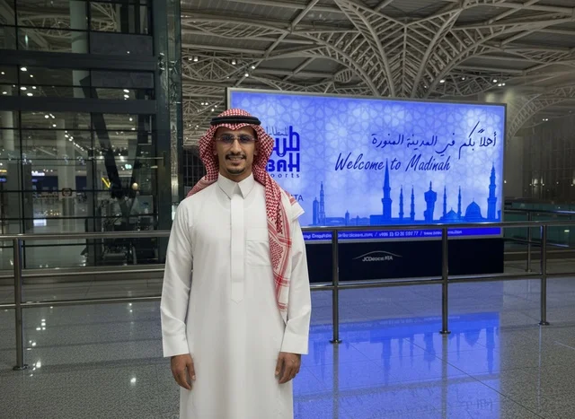 Saudi Man at Madinah Airport in Traditional Dress