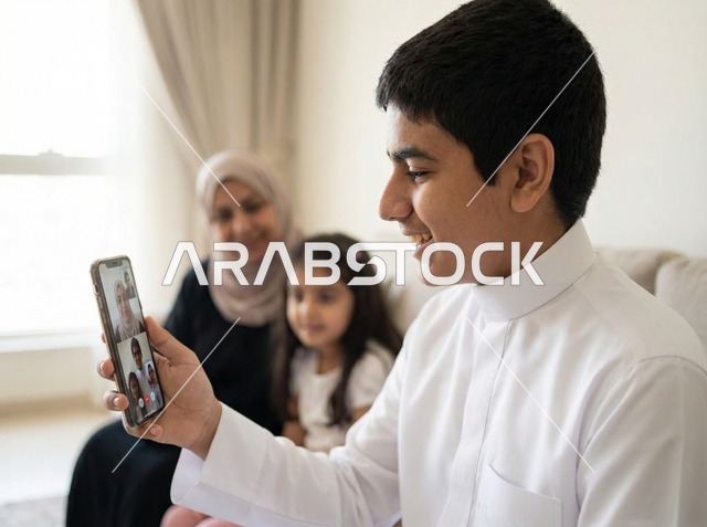 Saudi Boy in Thobe Video Calling Family at Home