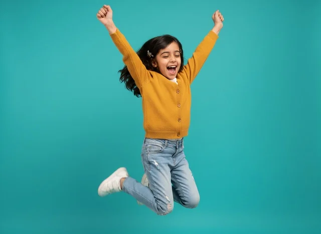 Excited Arab Girl Jumping in Yellow Cardigan and Jeans