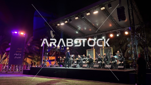 Orchestra performance at the Ithra Dhahran events at night.