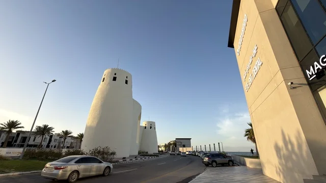 Qatif Sea Front Road with White Towers and Modern Buildings Qatif Sea Front Road with White Towers and Modern Buildings