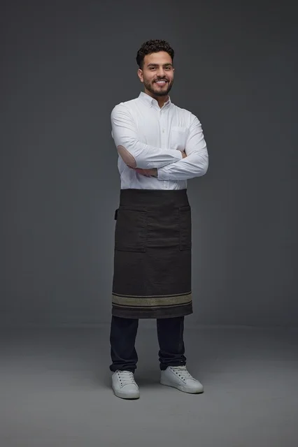 Middle Eastern Male Staff in Apron Studio Portrait