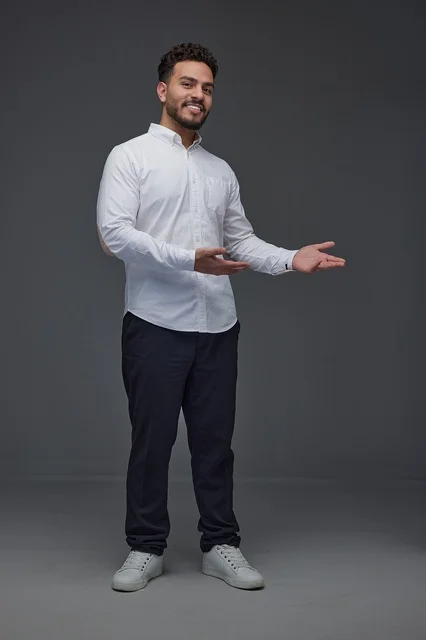 Saudi Man Presenting Gesture in Studio Setting