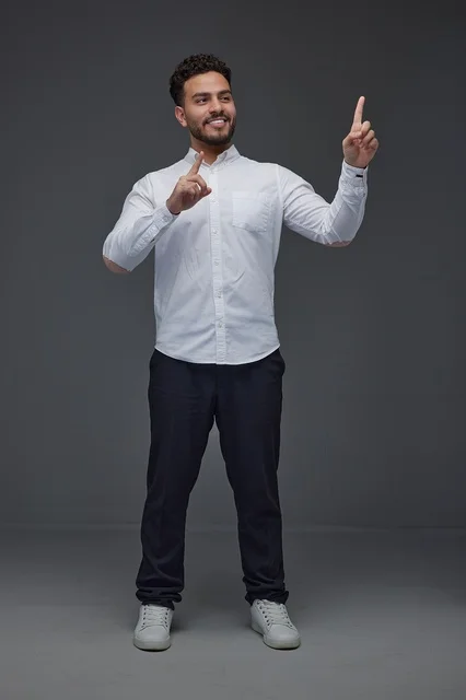 Saudi Man Gesturing Toward Virtual Interface Studio