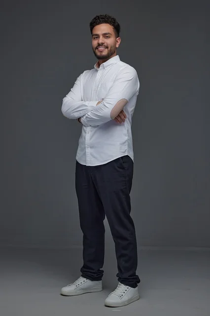 Saudi Man in Modern Casual Clothes Standing in Studio