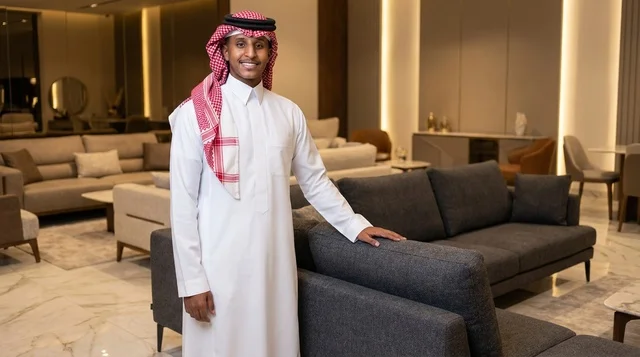 Saudi Man in Traditional Dress in Furniture Showroom Saudi Man in Traditional Dress in Furniture Showroom