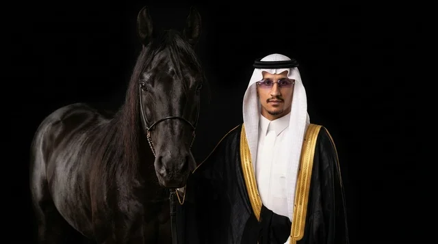 Saudi Man in Traditional Bisht with Black Arabian Horse