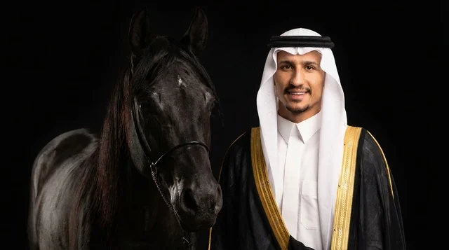Saudi Man with Black Arabian Horse in Traditional Bisht