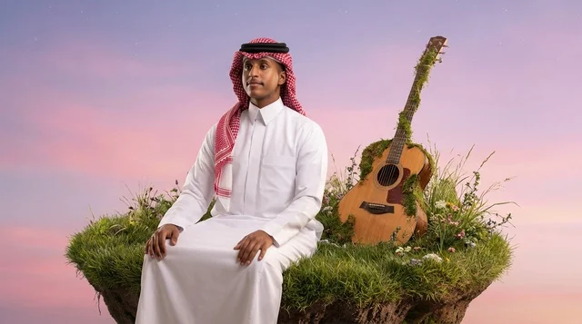 Saudi Man with Guitar on Floating Grass Island