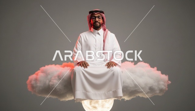 Saudi Man Meditating on a Floating Cloud in Studio