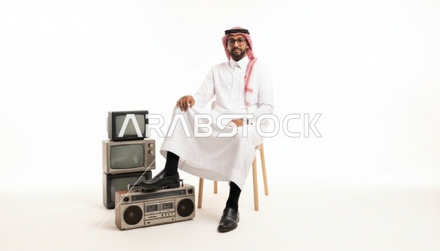 Saudi Man with Vintage Electronics in White Studio