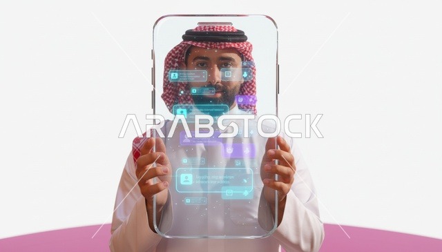 رجل سعودي يحمل شاشة رقمية شفافة بتقنية الهولوغرام