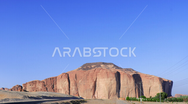 صورة إبداعية لجبل الحوارة في محافظة العلا بالمملكة العربية السعودية ، أماكن سياحية بالسعودية ، معالم تاريخية وأثرية قديمة في بلدة العلا القديمة ، المناطق الصحراوية في محافظة العلا ، المرتفعات الجبلية والتكوينات الصخرية الطبيعية بالعلا