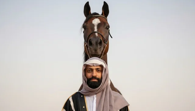 Emirati Man with Arabian Horse in Traditional Dress
