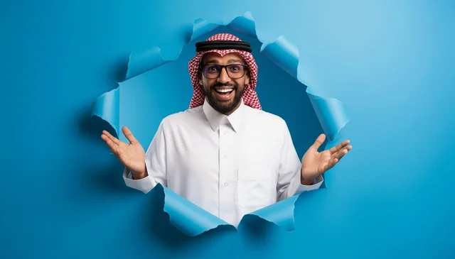 Saudi Man Peeking Through Blue Hole Smiling