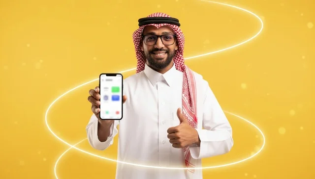 Saudi Man Holding Smartphone with Thumbs Up Gesture
