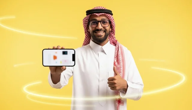 Saudi Man Holding Smartphone Thumbs Up Yellow Background