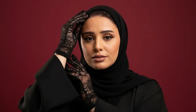 Saudi Woman in Black Abaya and Lace Gloves