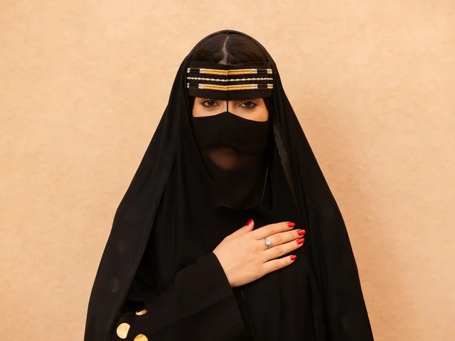 Emirati Woman in Traditional Abaya and Niqab Portrait