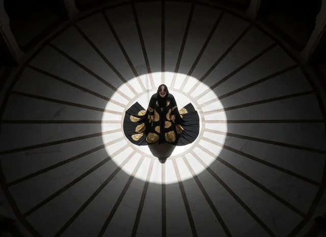 Emirati Woman in Traditional Abaya Top Down View