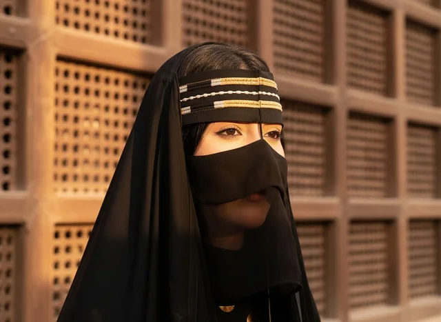 Saudi Woman in Traditional Niqab and Heritage Clothing