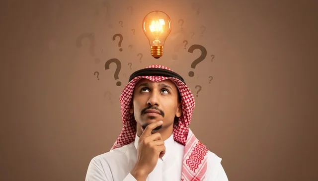 Saudi Man in Traditional Dress with Glowing Idea Lightbulb