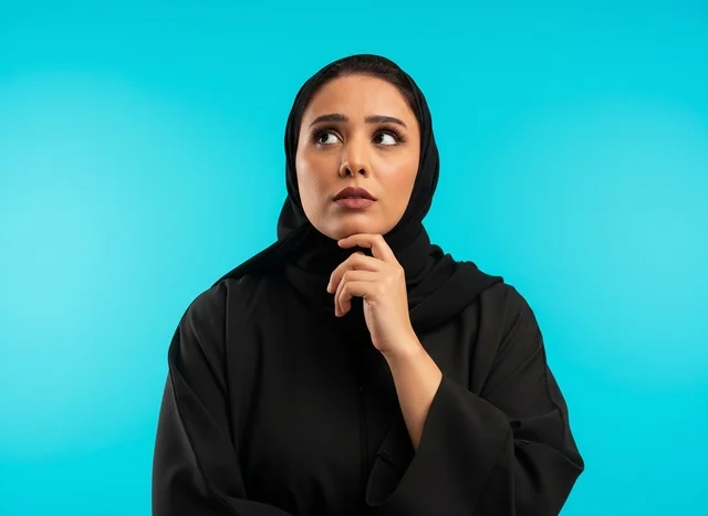 Saudi Woman in Abaya Thinking Against Cyan Background