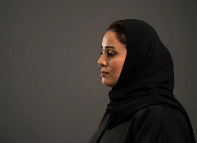Saudi Woman in Black Abaya Side Profile Portrait