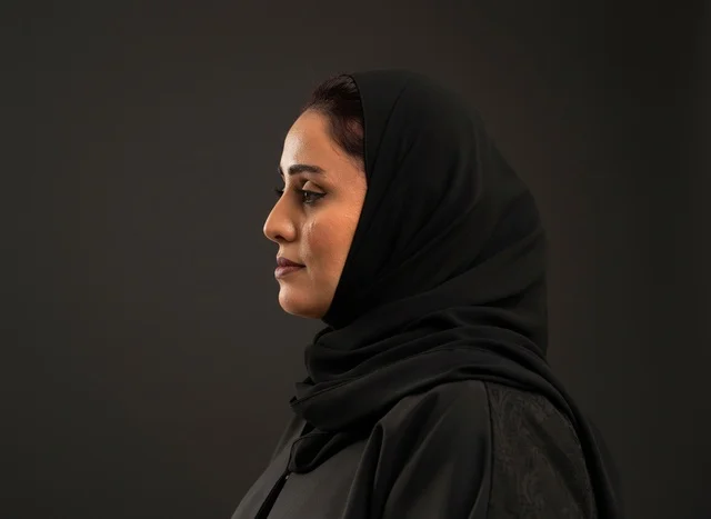 Saudi Woman in Black Abaya Side Profile Studio Portrait