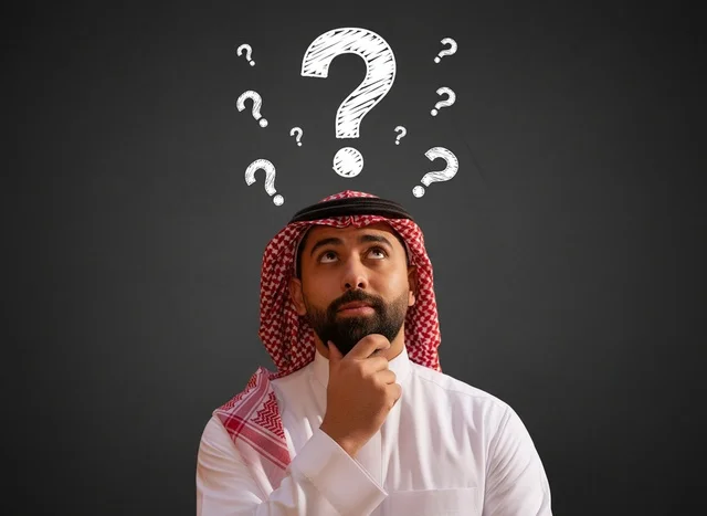 Saudi Man Thinking with Question Marks on Dark Background