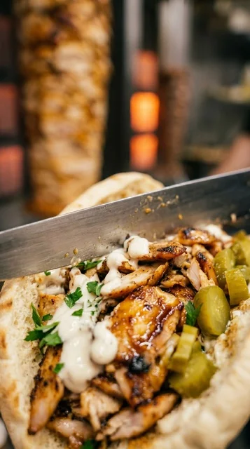 Chicken Shawarma Sandwich with Garlic Sauce and Pickles
