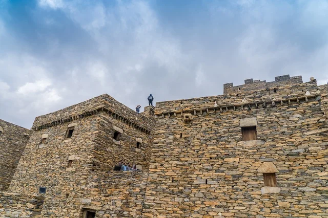 Stone Fortress Heritage Site Under Cloudy Sky