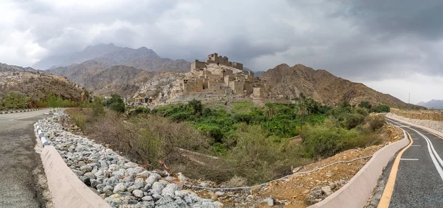 Ancient Stone Village in Rugged Mountain Landscape