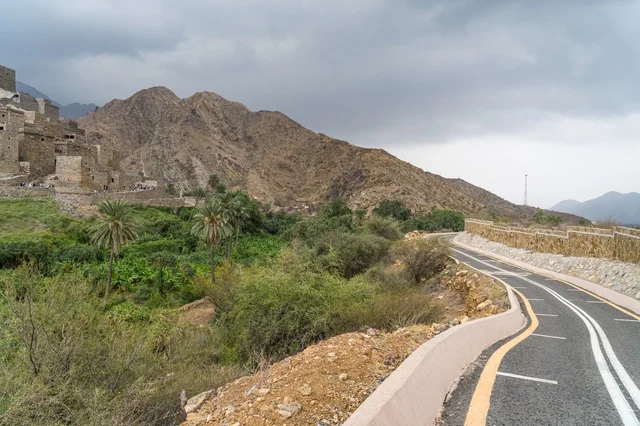 Winding Mountain Road and Traditional Stone Village