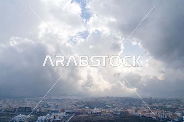Dense Storm Clouds Over Urban City Residential Area