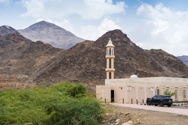 Small Mosque in Mountainous Rural Landscape