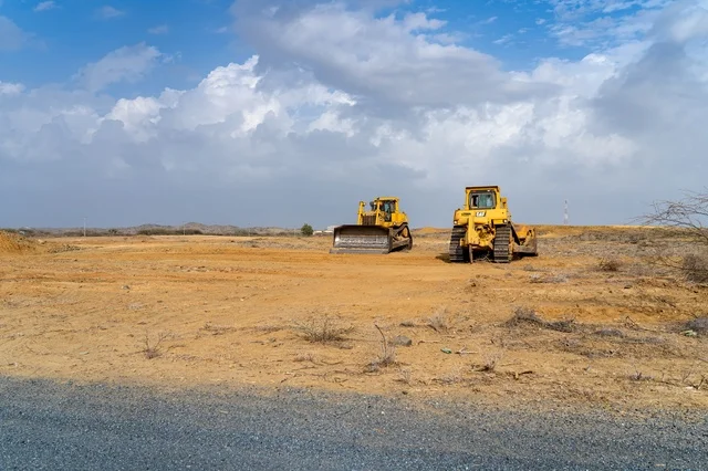 Heavy Bulldozers on Desert Construction Site