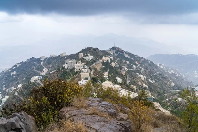 Mountain Village in Saudi Highlands with Misty Peaks