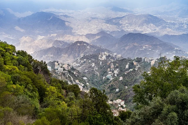 Mountain Village Settlement on Green Slopes
