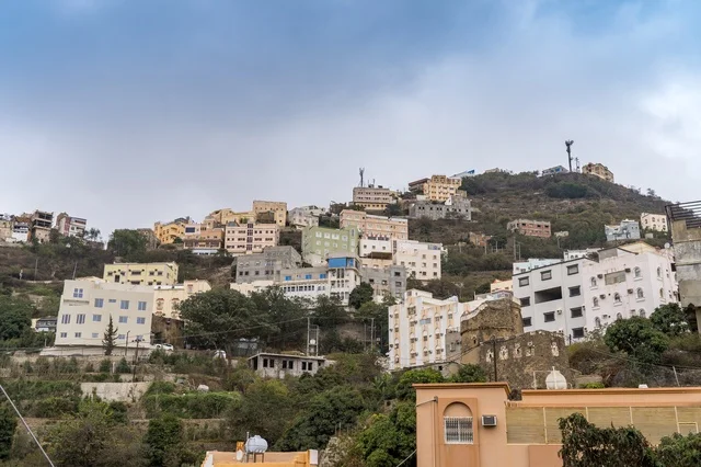 Mountain City Buildings on Green Hillside Saudi Arabia