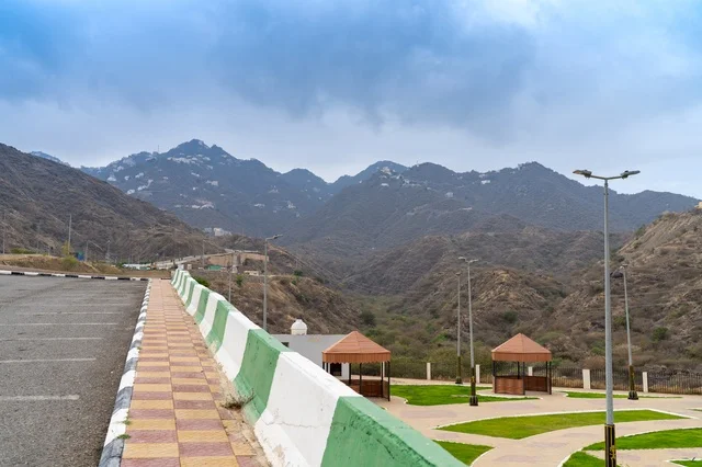 Mountain Park with Gazebos under Overcast Sky Landscape