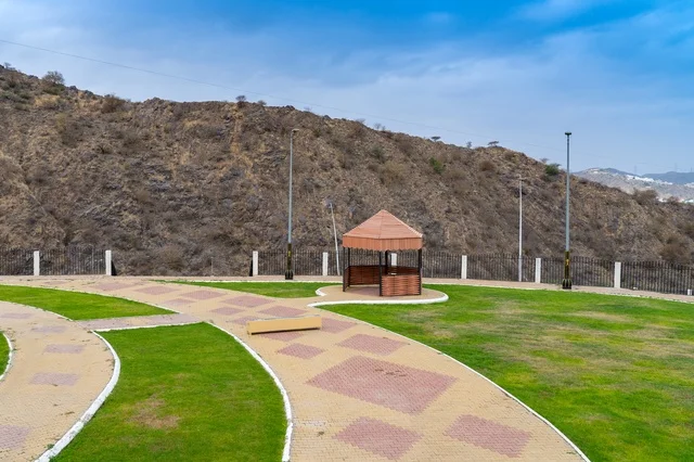 Public Park with Gazebo and Rocky Mountain Landscape