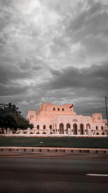 Royal Opera House Muscat Oman Under Cloudy Sky