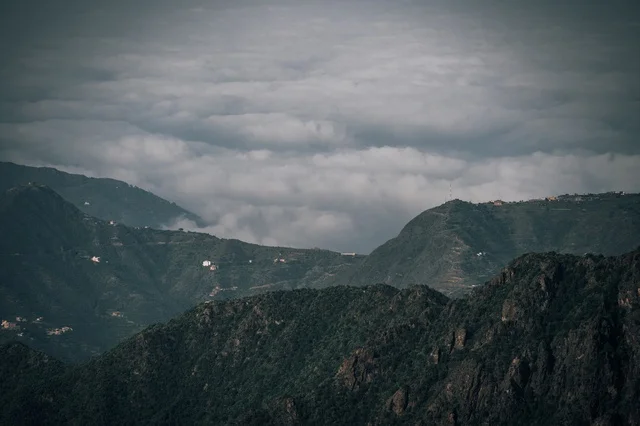 Abha Saudi Arabia Green Mountain Peaks and Low Clouds