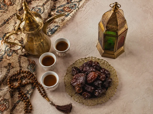 Traditional Arabic Coffee Dallah and Dates in Majlis