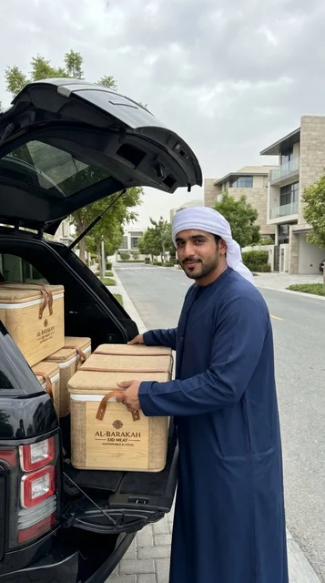 Emirati Man Distributing Eid Meat Boxes in UAE SUV